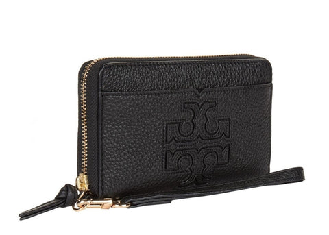 Tory Burch Harper Wristlet  executed in pure leather and finished with a large signature logo on the front
