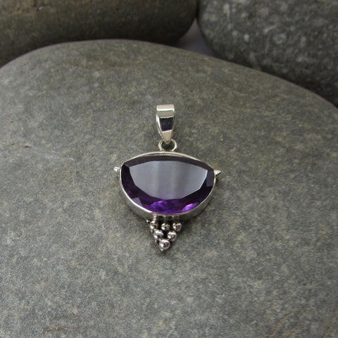 Sterling Silver Amethyst Pendant features a generous size half moon shaped cut amethyst gemstone finished with silver honeycomb motif