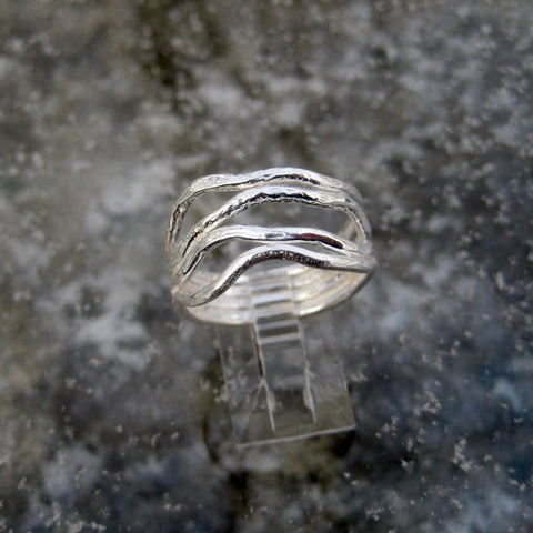 Sterling Silver Wave Ring inspired by the gentle waves of the ocean this ring is crafted in Sterling Silver with a brushed surface finish
