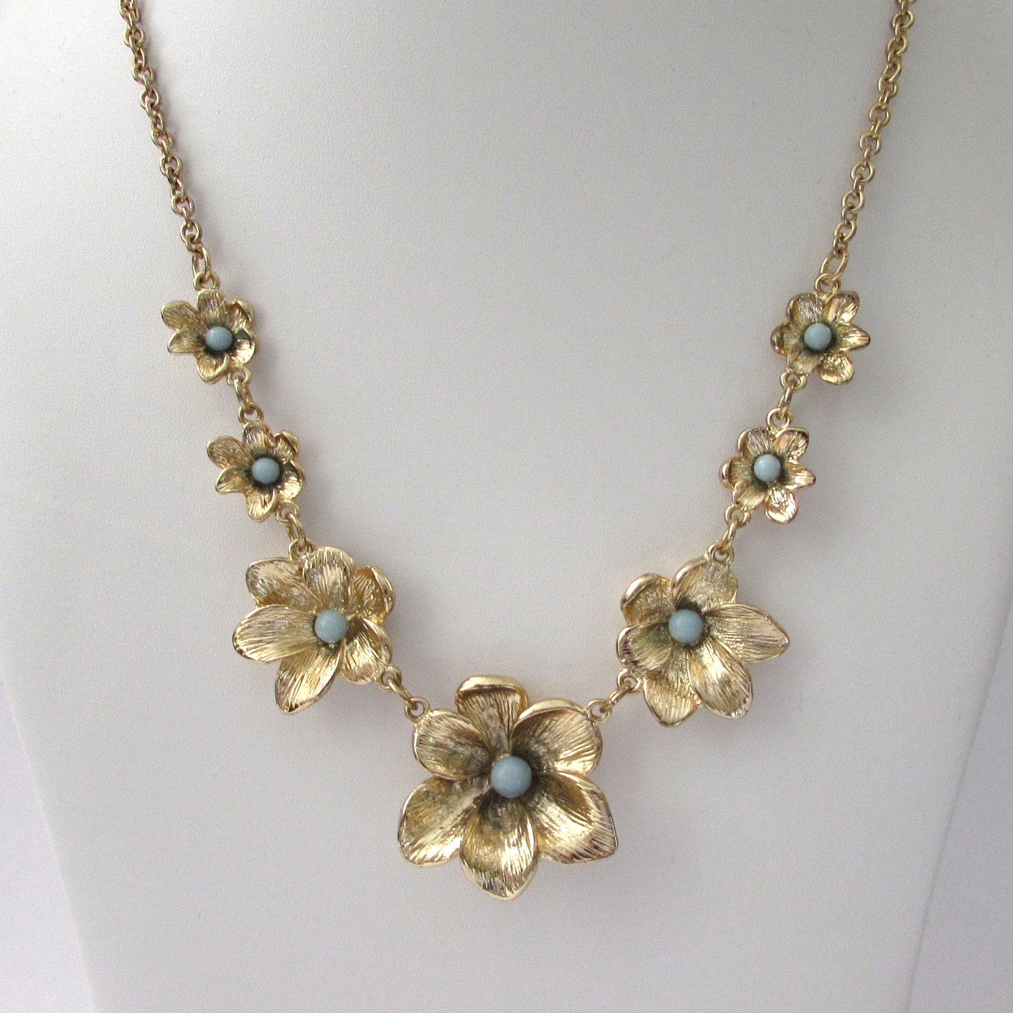 Stephen & Co Gold Tone Floral Blue Stone Necklace