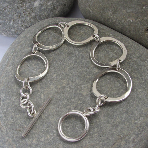 Sterling Silver Circle Link Bracelet features hammered circles connected with a single link giving the bracelet more flexibility