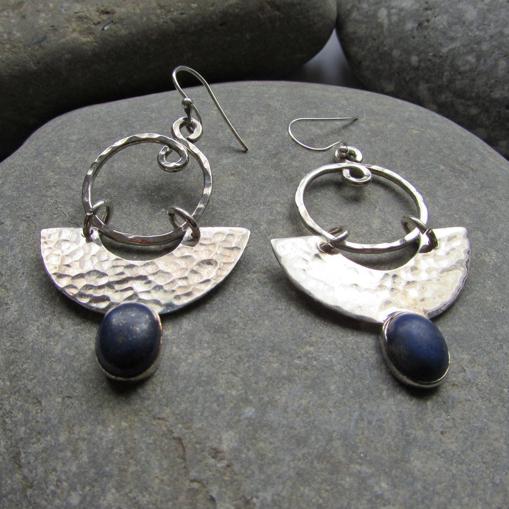 Sterling Silver Half Moon Lapis Earrings are crafted with Lapis and Sterling Silver featuring a half moon shape with a dimpled surface
