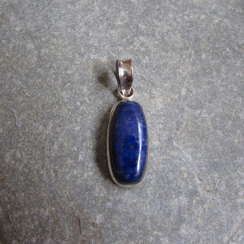 Sterling Silver Lapis Cabochon Pendant  features a cabochon shaped Lapis Lazuli gemstone set in sterling silver