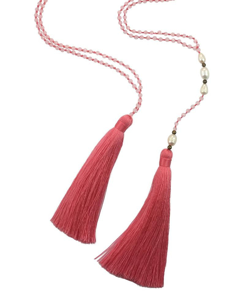 closeup of pearls and tassels